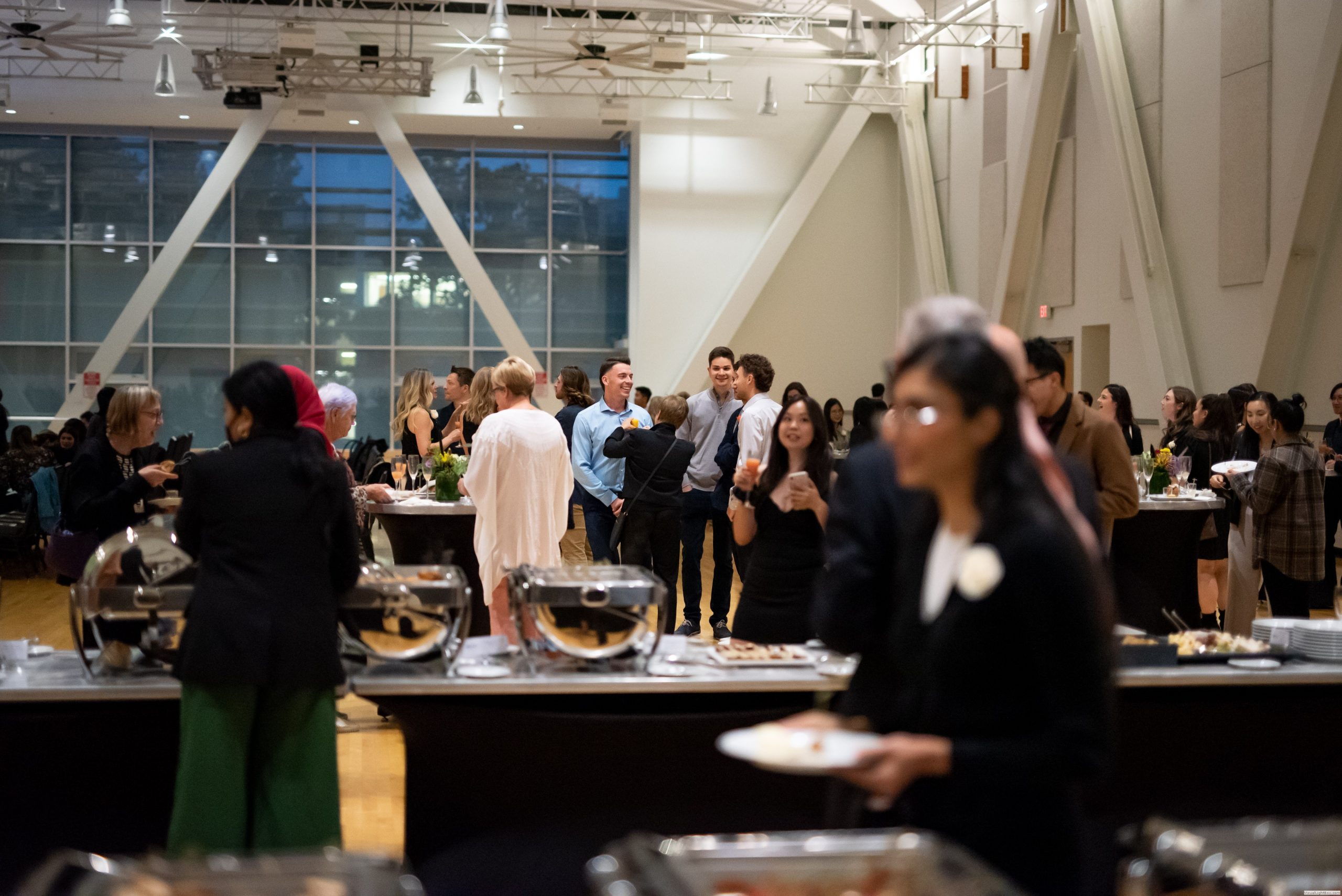 Award recipients and guests enjoying some refreshments at the event